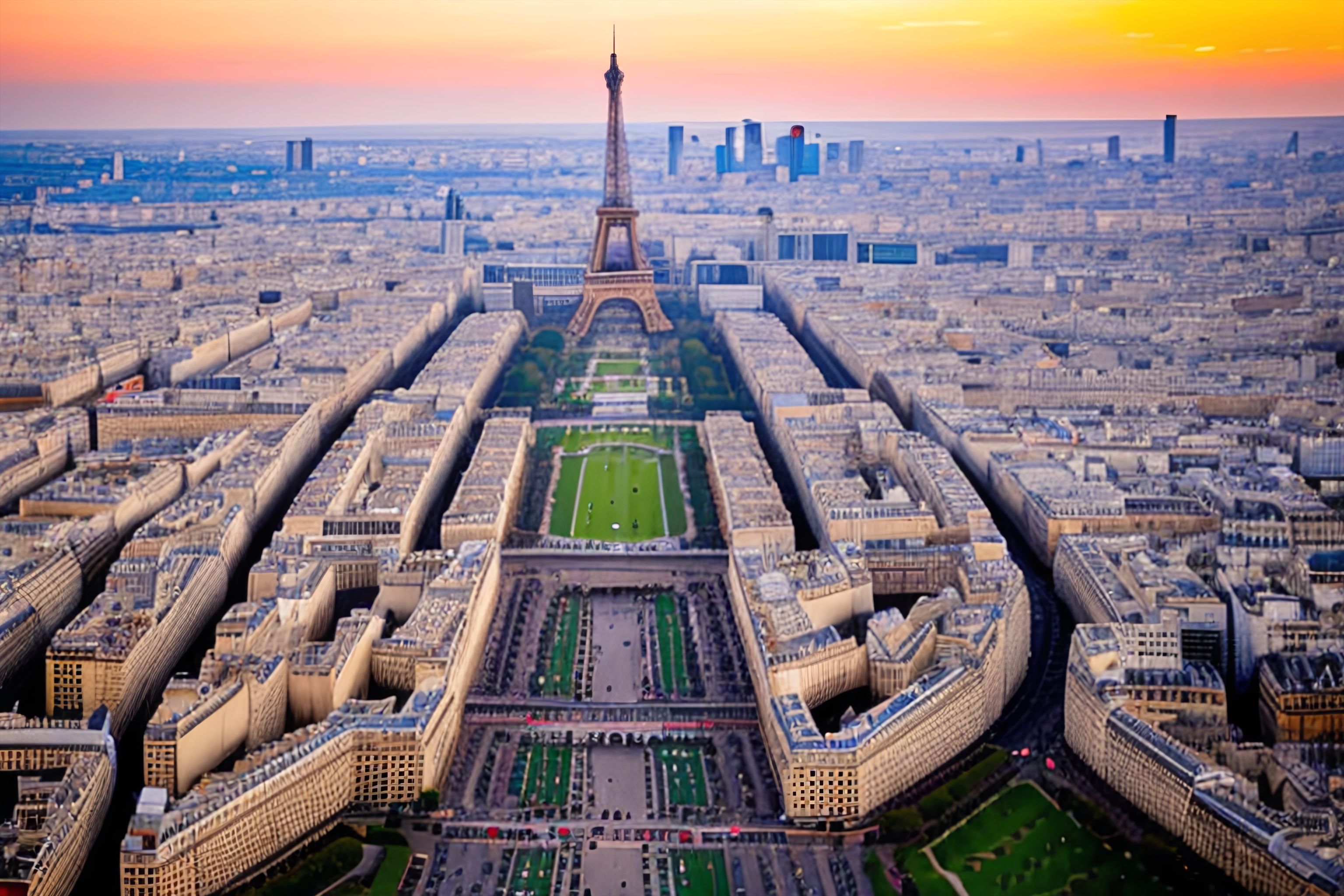 A view of Paris from the top of the Eiffel Tower at sunset